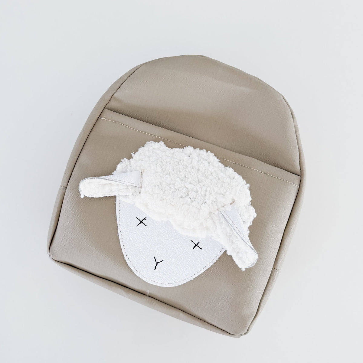 Les Petits Compagnons: Leather Backpacks